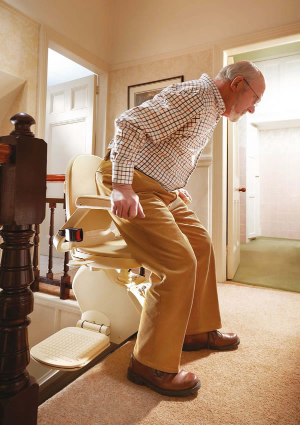 man getting out of stair lift